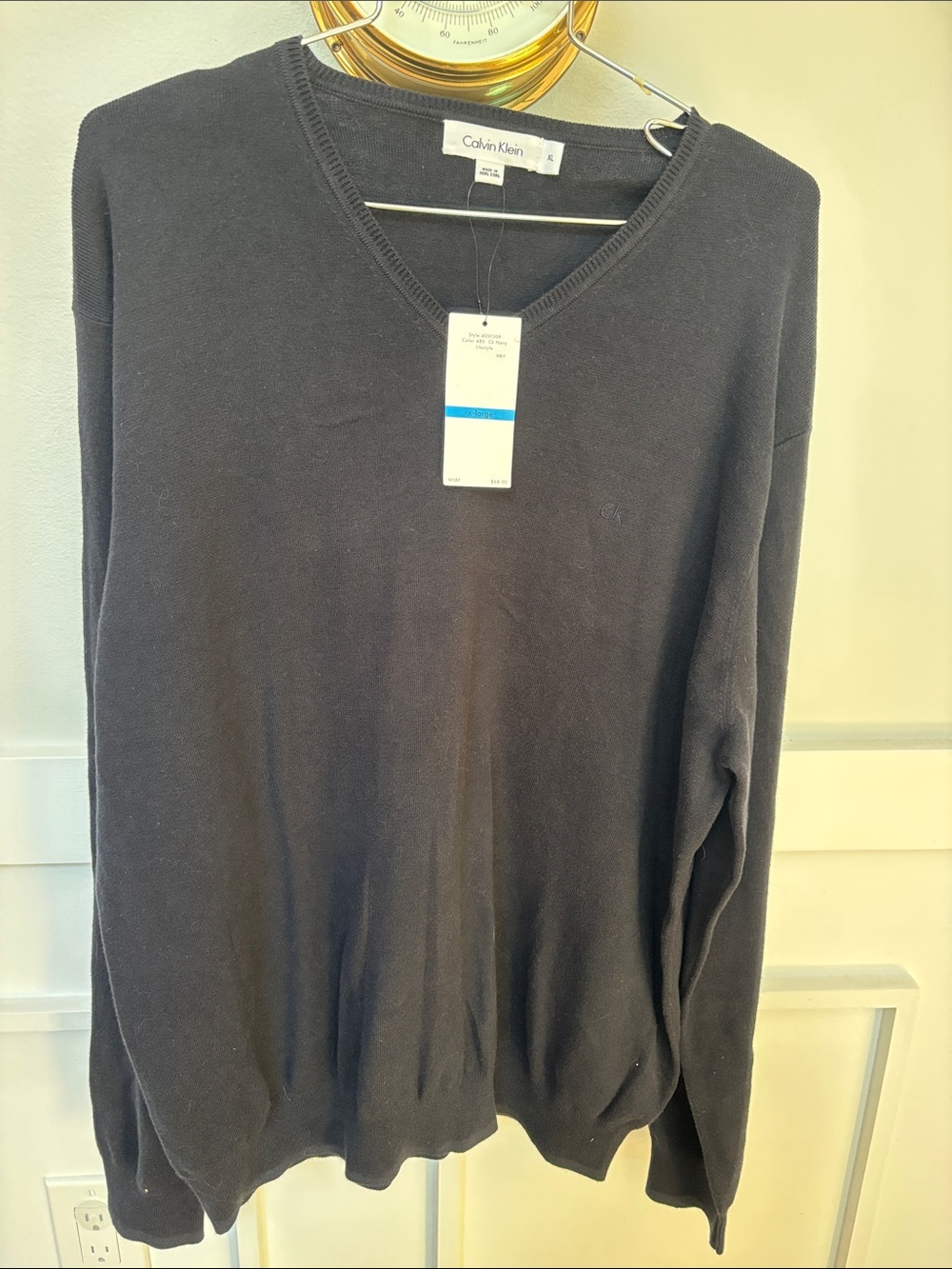 Calvin Klein V-neck sweater from their men's lifestyle apparel line size x large